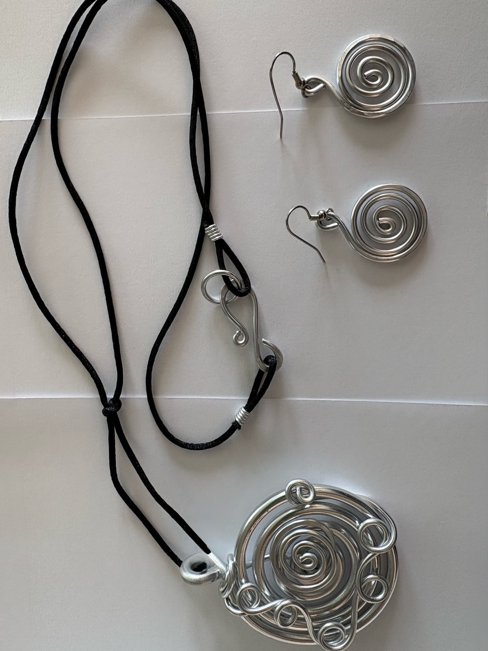 Silver Spiral Pendant Necklace with Matching Earrings - Black Cord